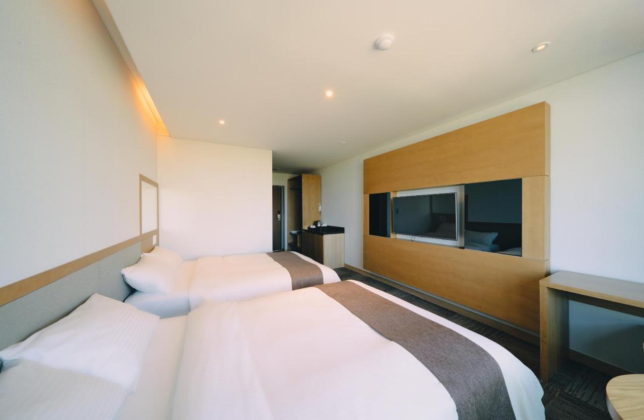 Jeju Poong Gyung Hotel Сеогвипо Стая снимка