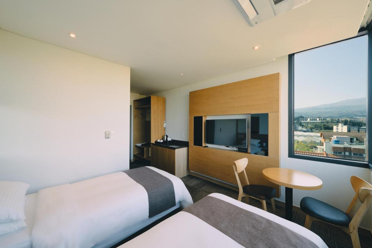 Jeju Poong Gyung Hotel Сеогвипо Екстериор снимка