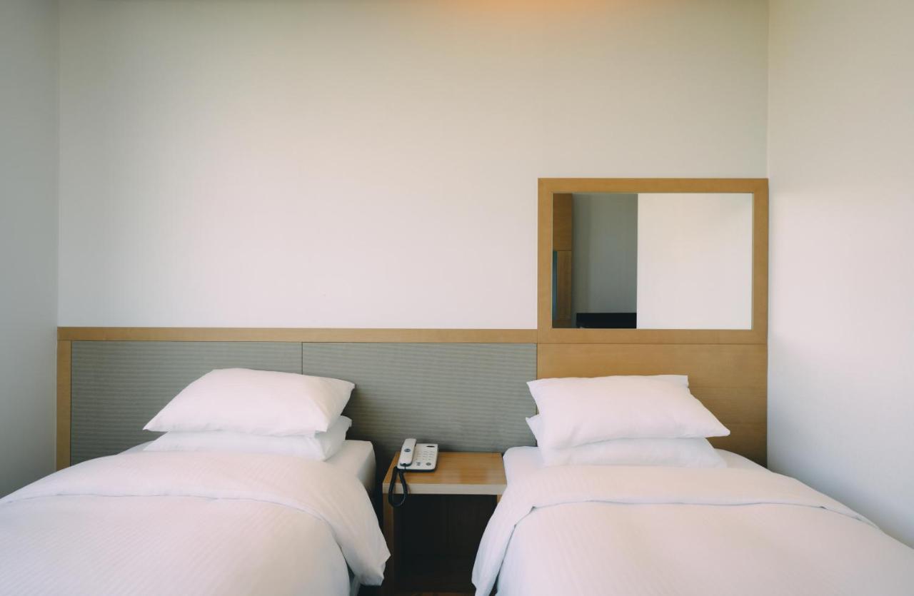 Jeju Poong Gyung Hotel Сеогвипо Екстериор снимка